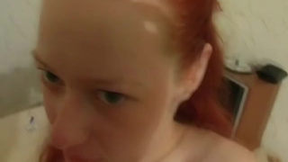 Redhead babe Klarissa is making blowjob